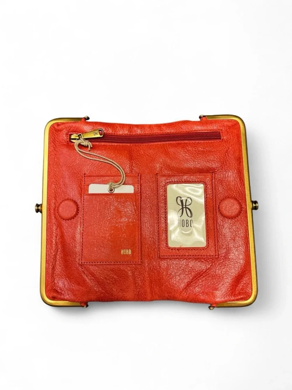 HOBO Orange Leather Kiss-Lock Clutch with Center Stitching